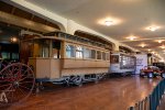 Two streetcars are on display at the Henry Ford Museum